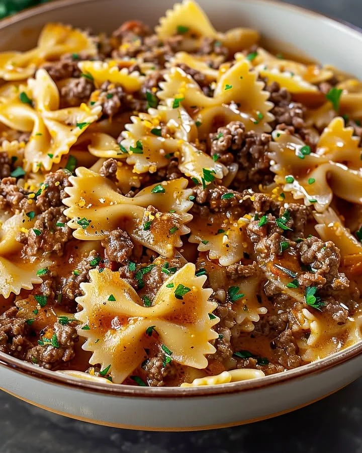 Bowtie pasta dish with ground beef cooked in a savory sauce