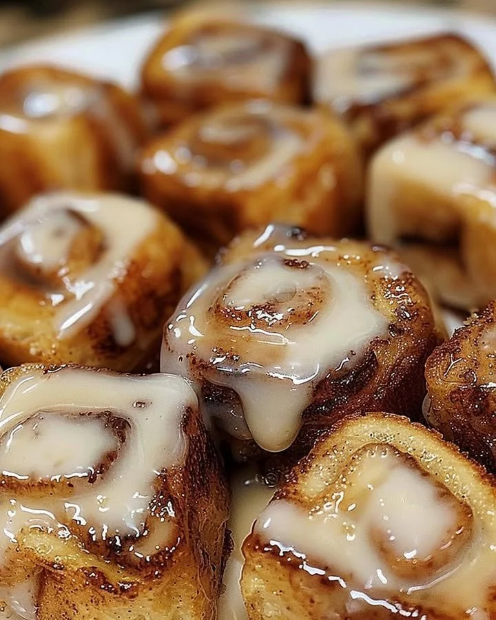 Delicious cinnamon roll French toast bites served on a plate