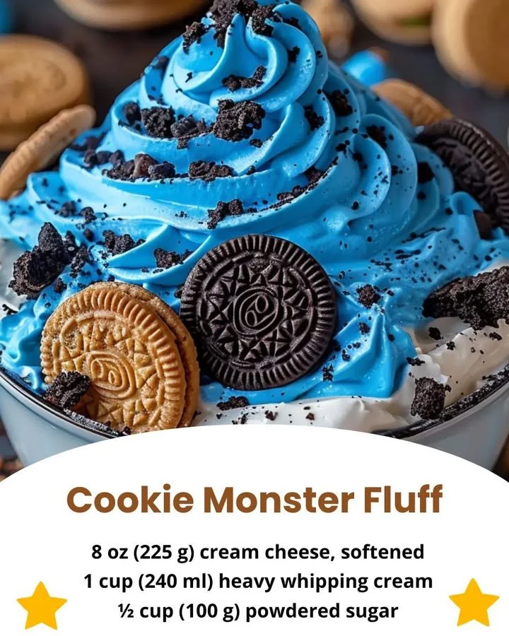 A bowl of Cookie Monster Fluff with cookies and blue whipped cream