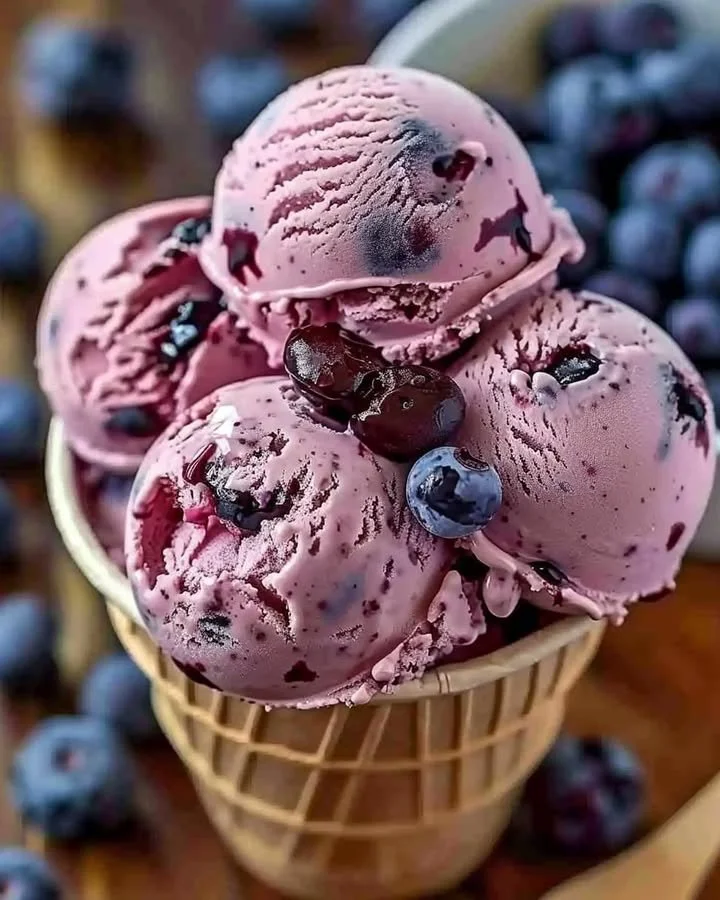 Crimson Choco Rhapsody ice cream in a bowl with chocolate shavings