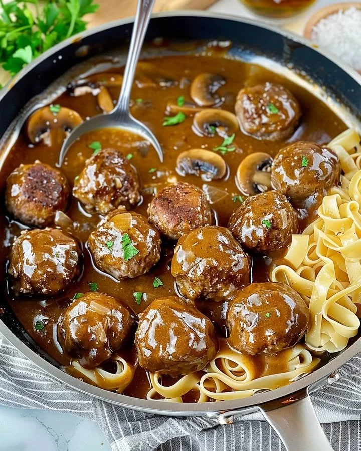 Gourmet meatballs served in savory mushroom gravy