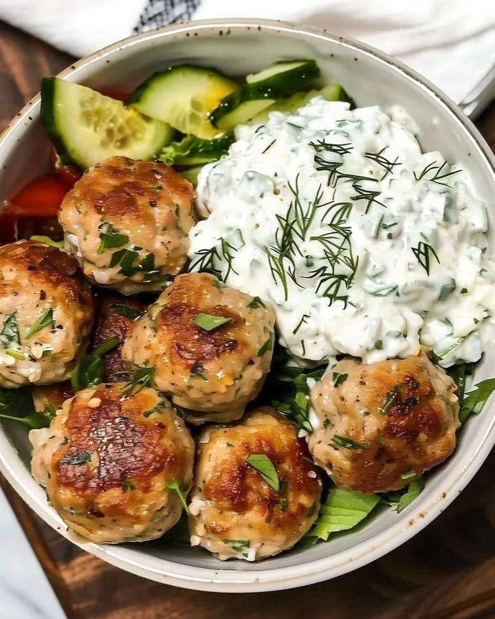 Delicious Greek chicken meatballs served with homemade tzatziki sauce