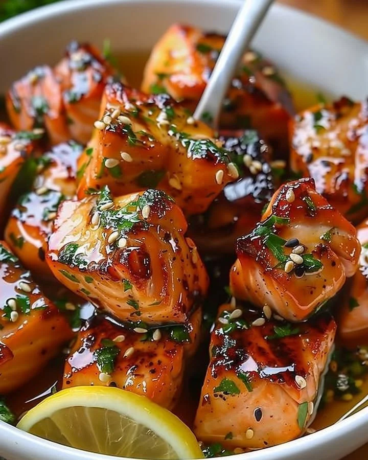 Honey butter garlic glazed salmon bites served on a plate