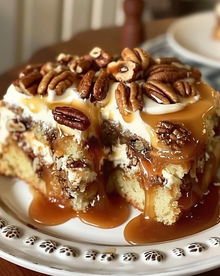Delicious Pecan Praline Poke Cake with a rich topping and pecans