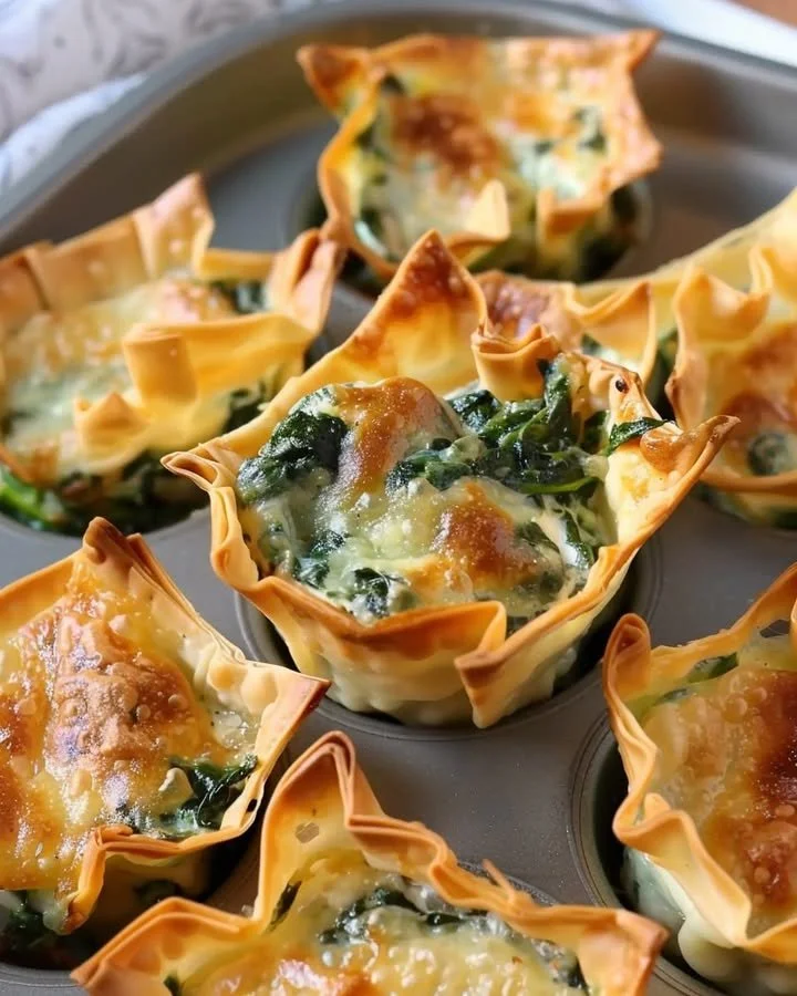 Delicious spinach and artichoke wonton cups served as an appetizer